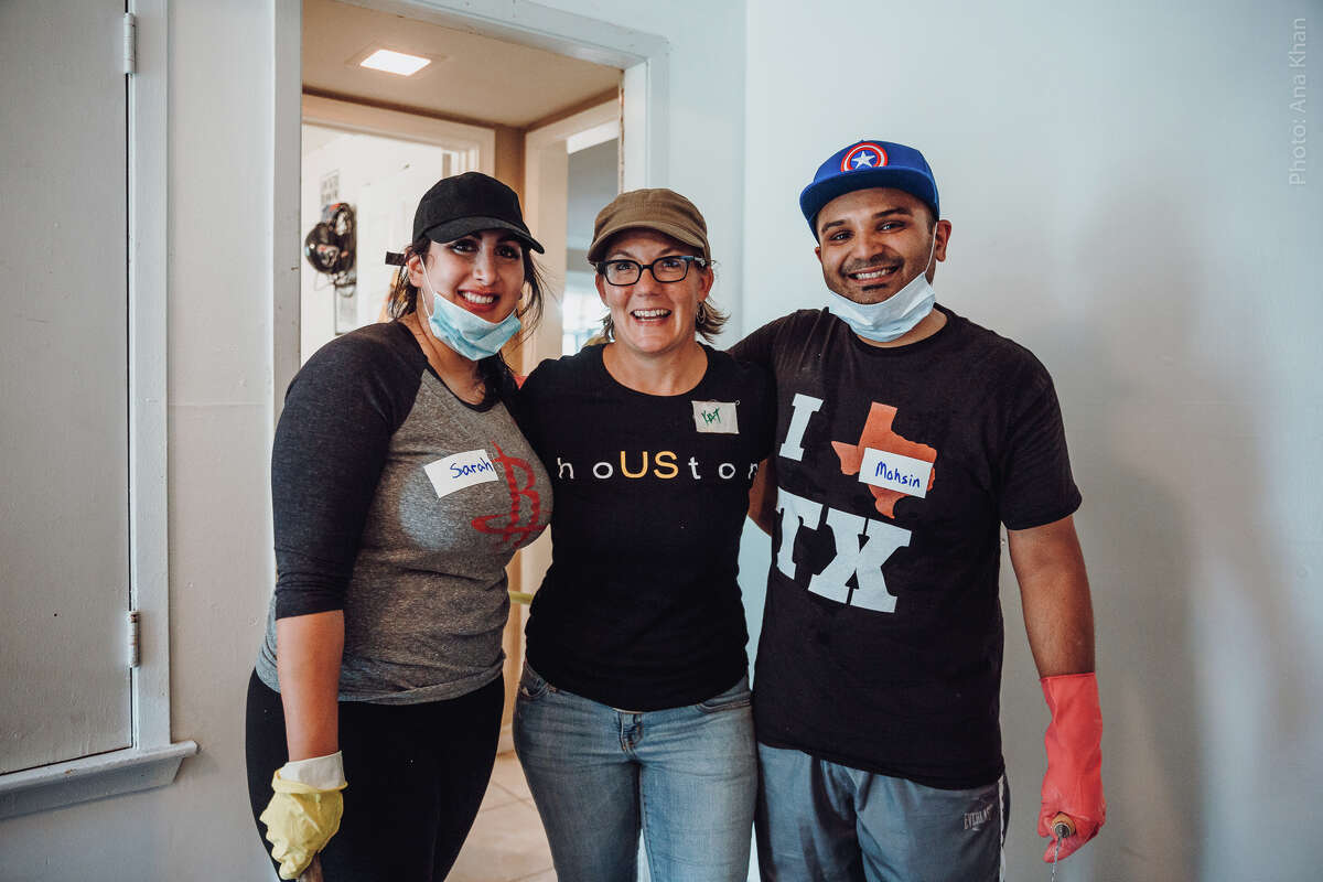 Wedding planner Kat Creech, center, with Sarah Samad and Mohsin Karedia. The couple postponed their Labor Day weekend and turned to Creech to help them volunteer. Creech founded Recovery Houston, a grassroots volunteer organization started after Hurricane Harvey hit the Houston area.