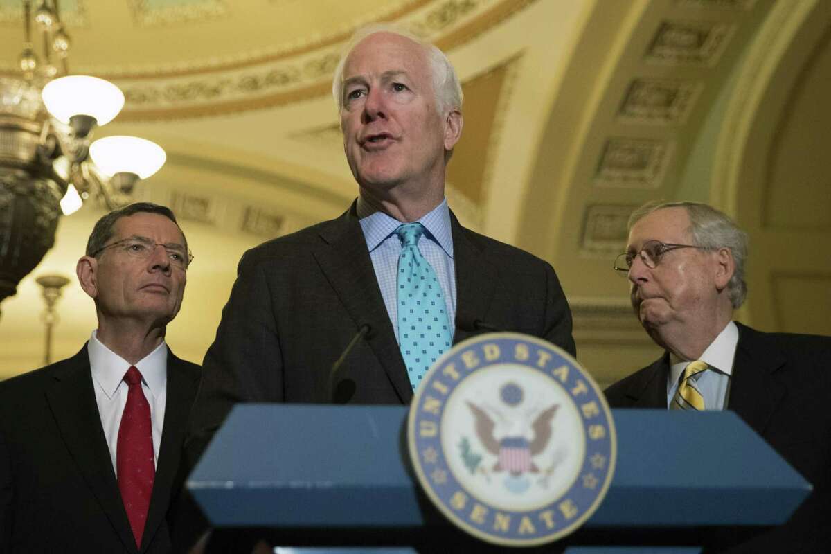 Sen. John Cornyn (R-Texas) speaks after a weekly luncheon, on Capitol Hill in Washington, Sept. 6, 2017. President Donald Trump struck a deal with Democratic leaders on Wednesday to increase the debt limit and finance the government until mid-December, undercutting his Republican allies to resolve a major dispute for the first time since taking office. (Tom Brenner/The New York Times)