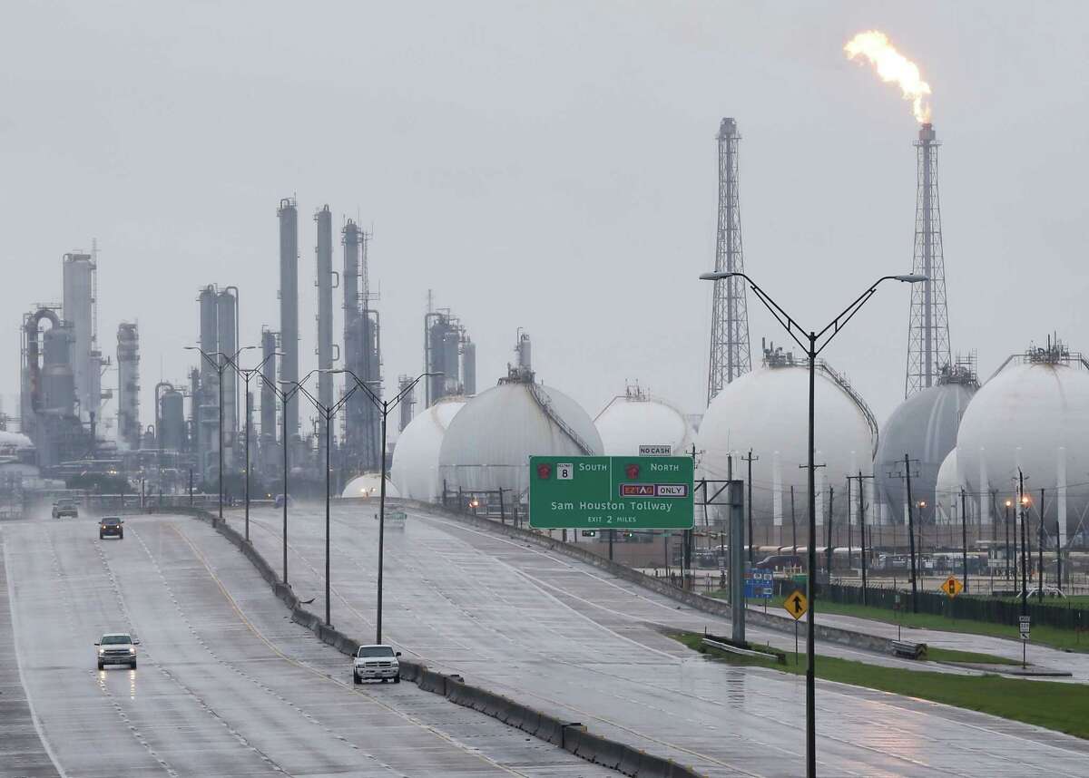 A flare is seen Aug. 29 at Shell's Deer Park refinery, where two tanks were damaged by the storm. Several plants shut down after Hurricane Harvey made landfall are coming back on line.