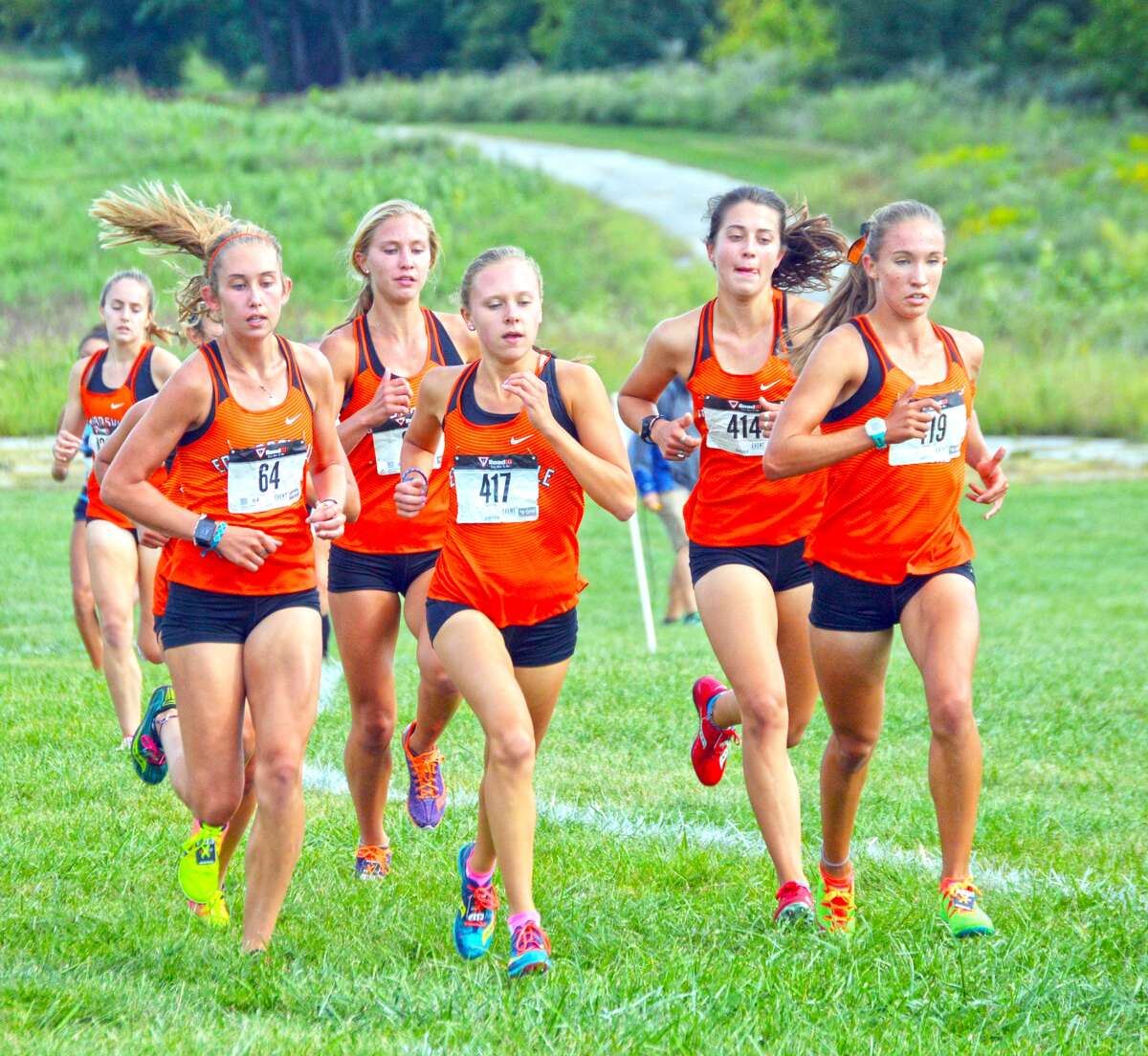 The Edwardsville girls cross country team runs in a pack during the Tiger Classic on Wednesday at the SIUE course.