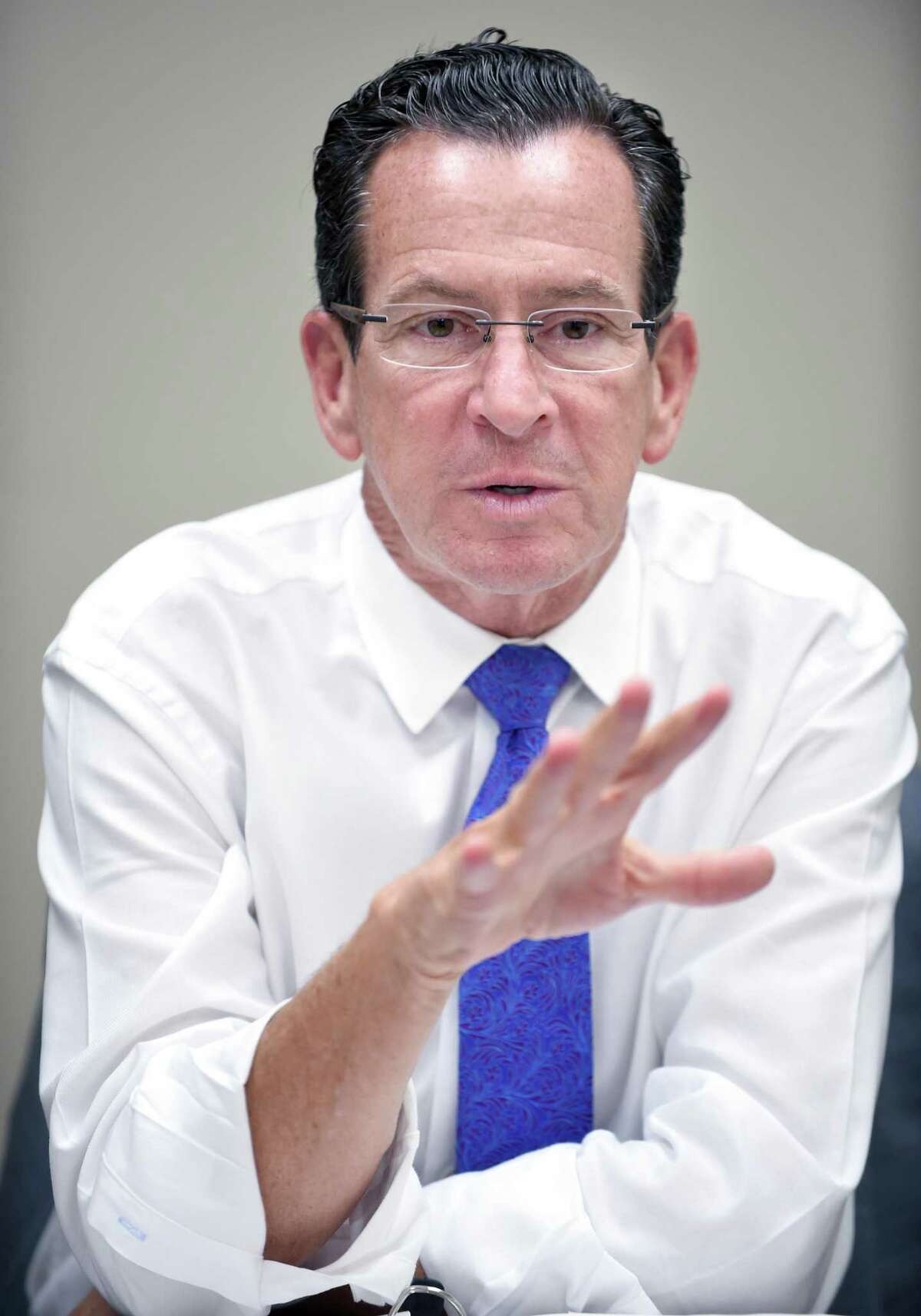 Malloy sits in for a Hearst Connecticut Editorial Board session at the New Haven Register on Thursday, Sept. 7, 2017.
