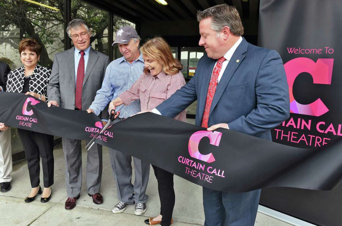 From left, Supervisor Paula Mahan, Assemblymember Phil Steck owners Peter and Carol Max and County Executive Dan McCoy cut a ribbon on Curtain Call Theatre's new home in the chapel of the former Little Sisters of the Poor Residence, now the Ashfield Apartments, Thursday Sept. 7, 2017 in Colonie, N.Y. Curtain Call recently kicked off its 30th season and a new audience program, which will allow kids and grandchildren of subscribers to attend shows for free, this year. (John Carl D'Annibale/Times Union)