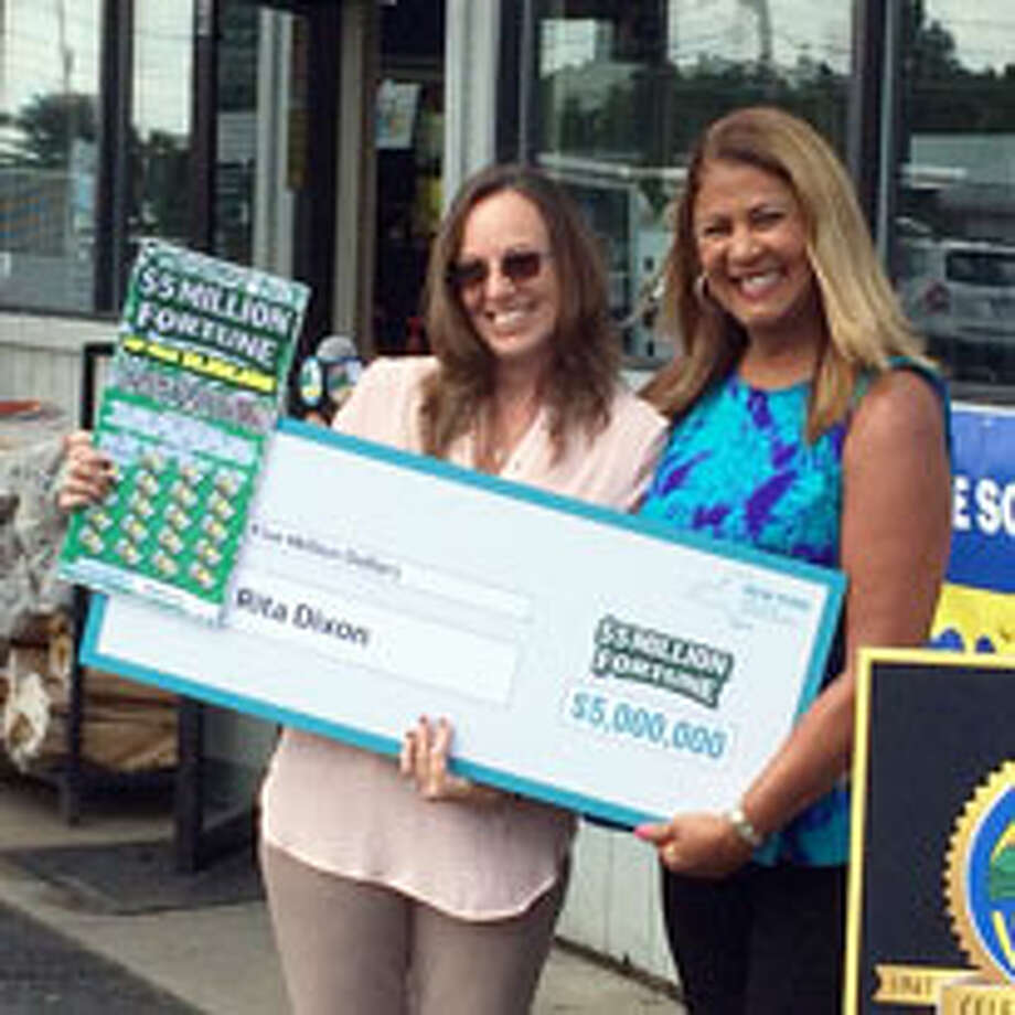 What would it be like to win a big Lottery prize? Click through for some Capital Region people who know the answer. Rita Dixon of Gansevoort, left, accepts her $5 million Lottery prize check from the state Lottery’s Yolanda Vega on Thursday, Sept. 7, 2017, at the Xtra Mart on Saratoga Road in Fort Edward. Photo: State Lottery