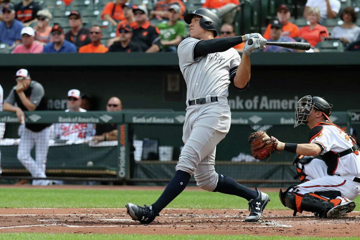 BALTIMORE, MD - SEPTEMBER 07: Aaron Judge #99 of the New York Yankees follows his two RBI home run against the Baltimore Orioles in the first inning at Oriole Park at Camden Yards on September 7, 2017 in Baltimore, Maryland. (Photo by Rob Carr/Getty Images) ORG XMIT: 700012347