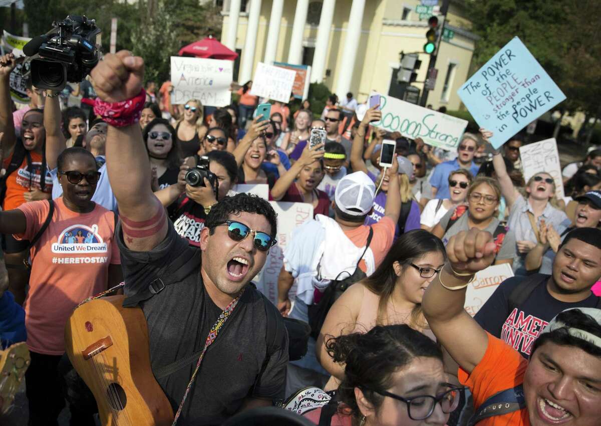 Protesters demonstrate in support of recipients of the Deferred Action for Childhood Arrivals program, in Washington, Sept. 5, 2017. The rollback of the DACA program could disrupt many other aspects of immigrants lives, like health care, financial aid and drivers licenses.