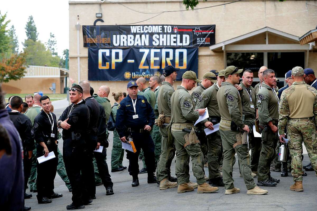 Attendees line up for a seminar during the opening day of Urban Shield at the Alameda County Fairgrounds in Pleasanton, Ca., on Fri. September 8, 2017.