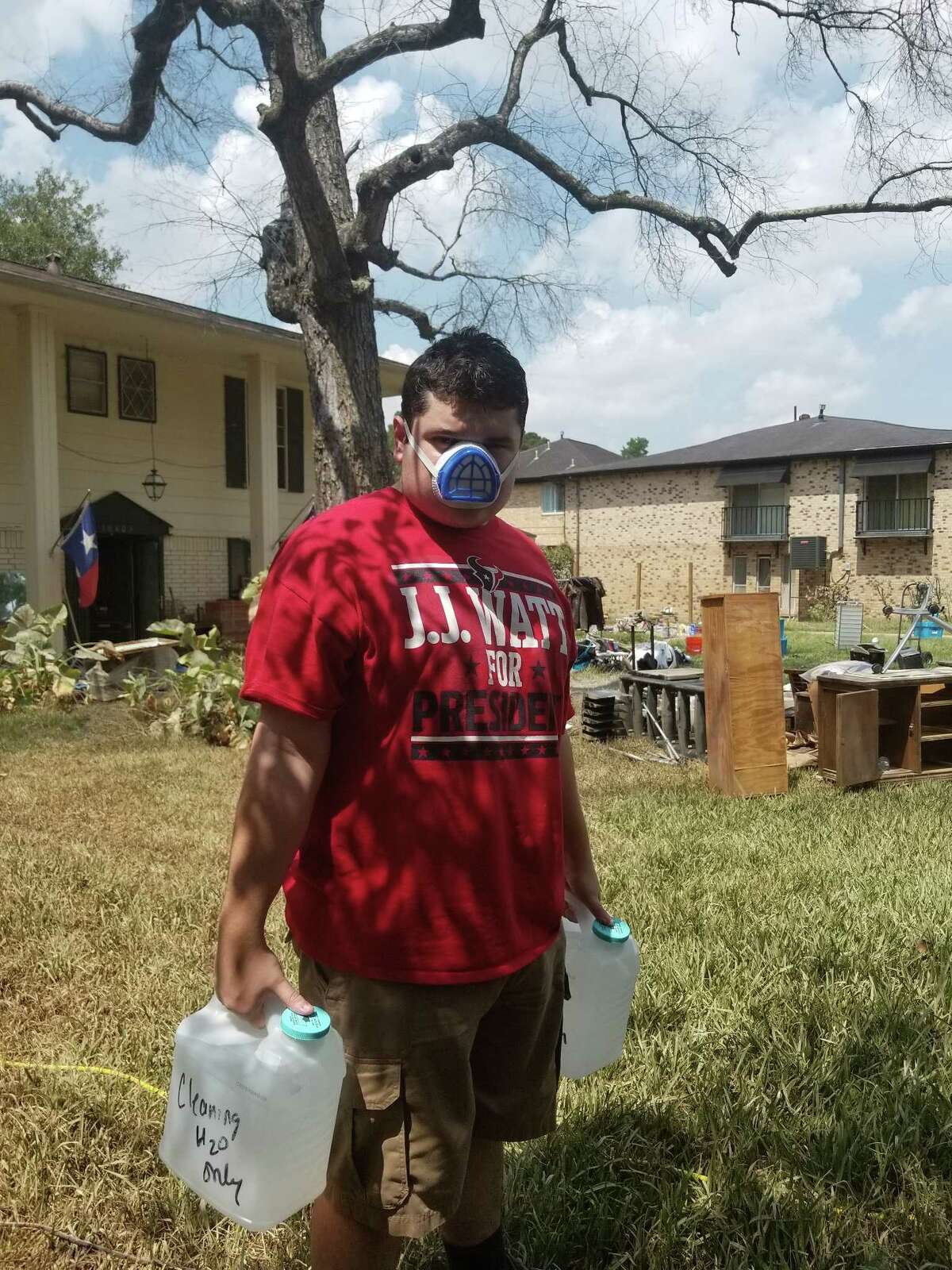 Grant Manier, a 22-year-old with autism, is helping clean up storm-damaged homes.