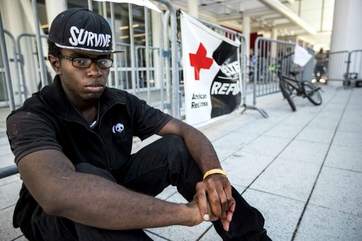 Damon Hale, 24, who is living in the shelter at the George R. Brown Convention Center after evacuating from his home in the aftermath of Tropical Storm Harvey, poses for a portrait on Friday, Sept. 8, 2017, in Houston. Since Hale did not have a formal lease prior to the storm, therefore can't get FEMA assistance. ( Brett Coomer / Houston Chronicle )