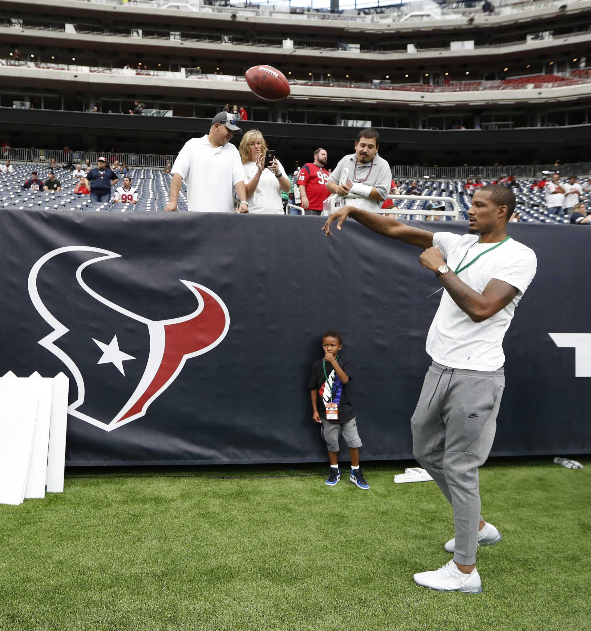 September 10, 2017: Houston Texans defensive end J.J. Watt (99) tosses the  ball with fans in the stands prior to the start of the NFL game between the  Jacksonville Jaguars and the