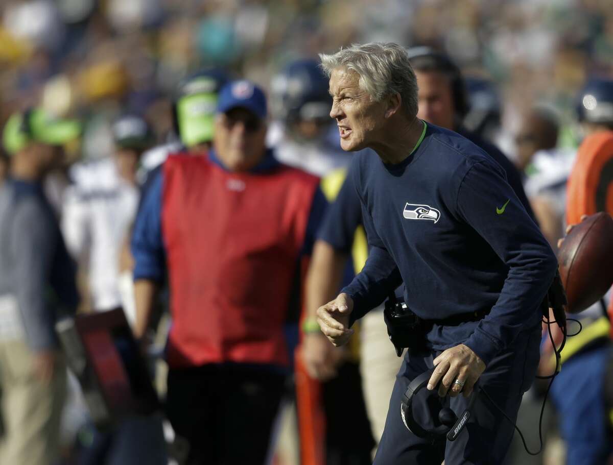 Seattle Seahawks head coach Pete Carroll reacts during the first half of an NFL football game against the Green Bay Packers Sunday, Sept. 10, 2017, in Green Bay, Wis. (AP Photo/Jeffrey Phelps)