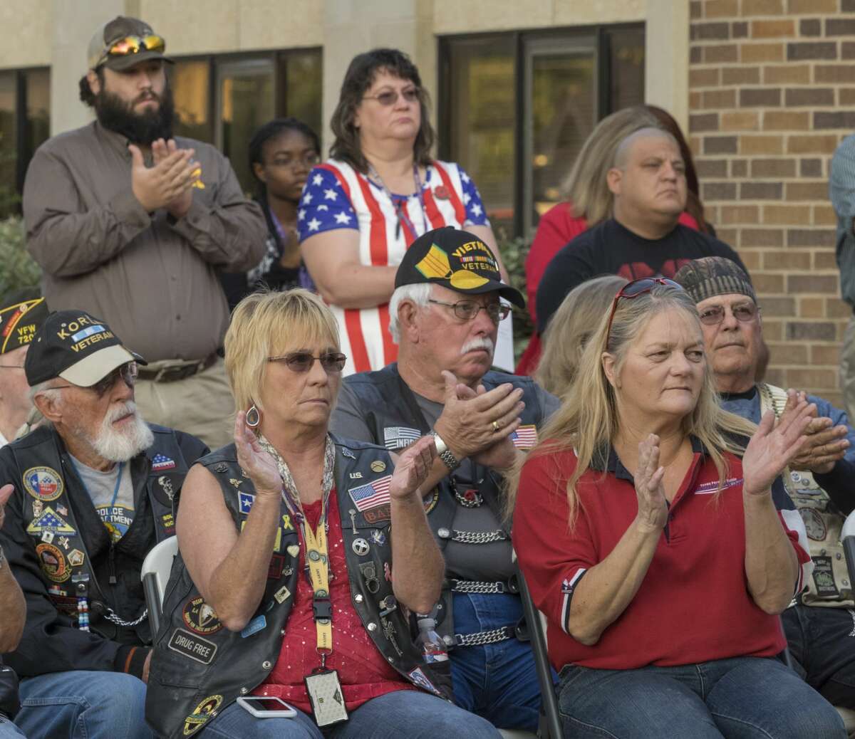 Audience members listen to speakers 9/11/17 outside Midland High School at the 16th annual 9-11 Memorial. Tim Fischer/Reporter-Telegram