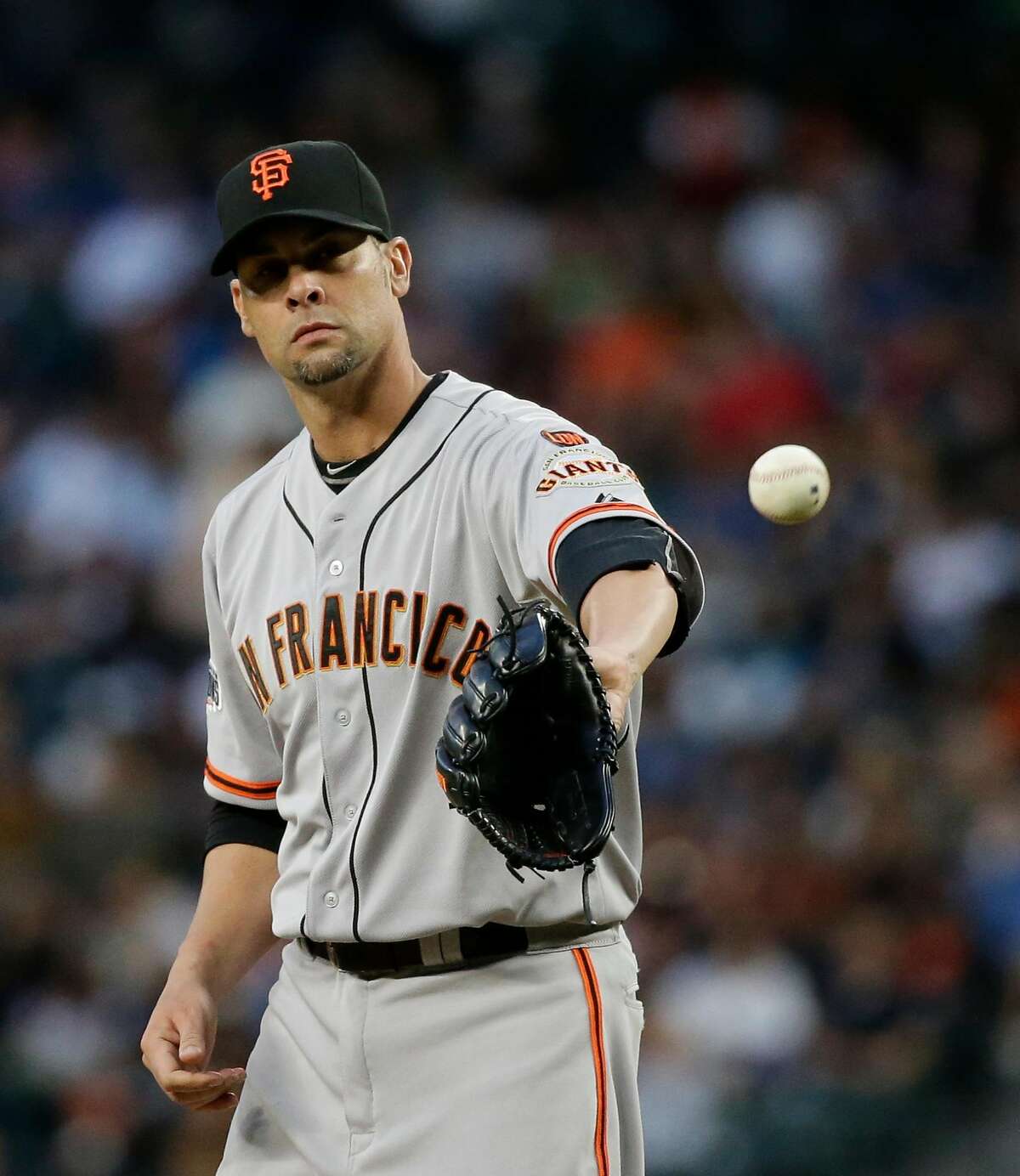 San Francisco Giants starting pitcher Ryan Vogelsong in action against the Seattle Mariners in a baseball game Thursday, June 18, 2015, in Seattle. (AP Photo/Elaine Thompson)