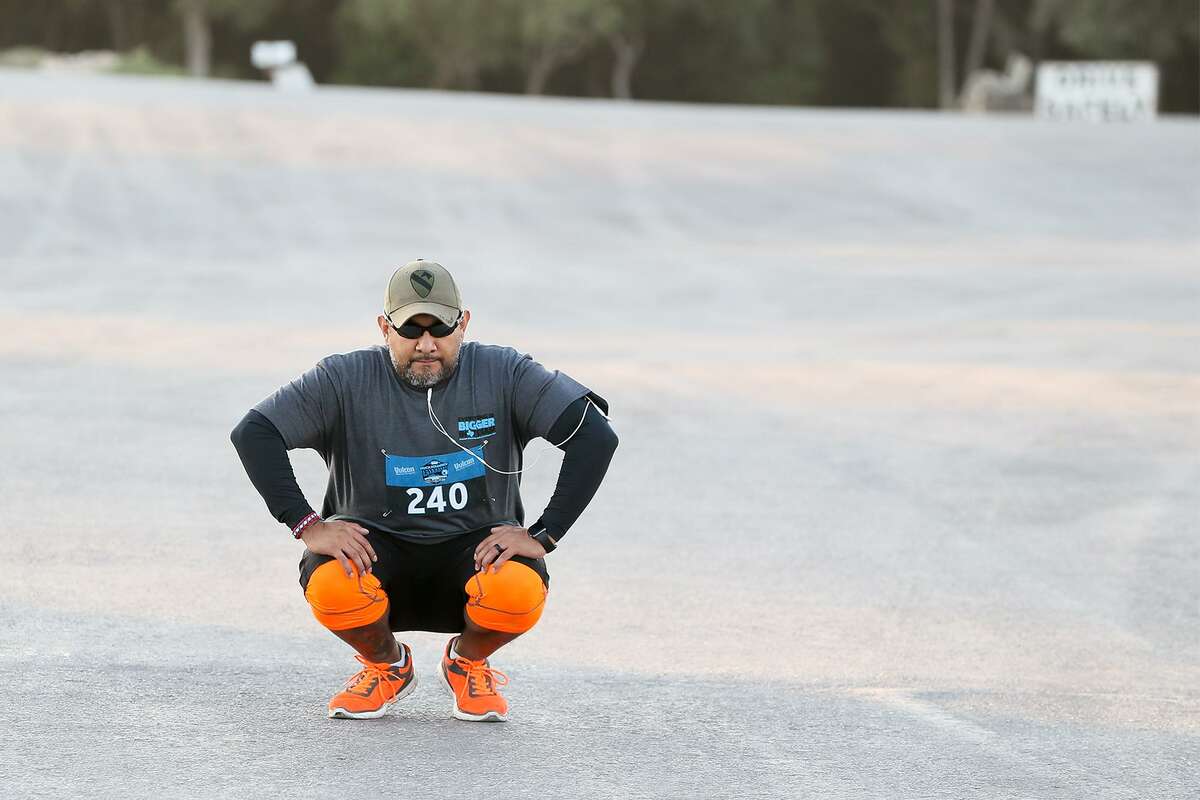 Daniel Bernal finds a quite place to stretch before the start of the Quarry Crusher run at Vulcan Materials Company 1604 Quarry, 4303 N. Loop 1604 E, on Saturday, Sept. 9, 2017. MARVIN PFEIFFER/mpfeiffer@express-news.net