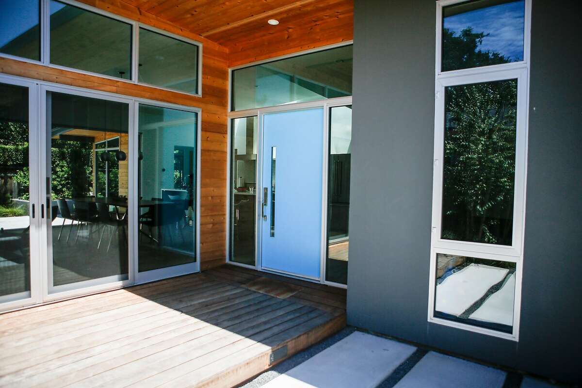 The blue front door of the remodeled home of Susan Wang and James Czaja in in San Carlos on Saturday, July 15, 2017. The Czaja -Wang family moved into their home on Dec. 31, 2015 after the year and a half remodeling process.
