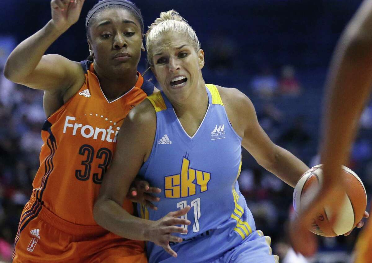 In this July 22, 2016, file photo, Chicago Sky forward Elena Delle Donne, right, drives as Connecticut Sun forward Morgan Tuck defends during a WNBA basketball game in Rosemont, Ill. Tuck will step onto the Team USA practice court later this month.