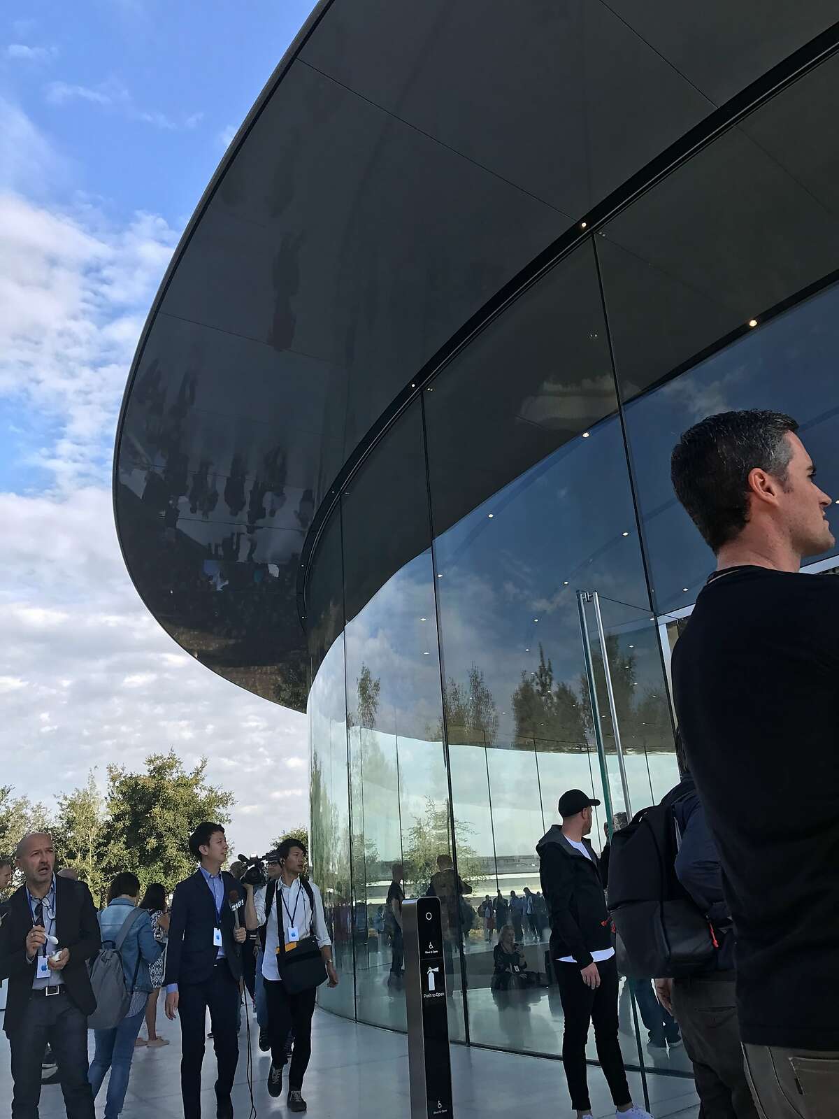 Scenes outside the Steve Jobs Theater on the Apple Park headquarters campus in Cupertino on Tuesday before the company reveals its latest iPhones and other products