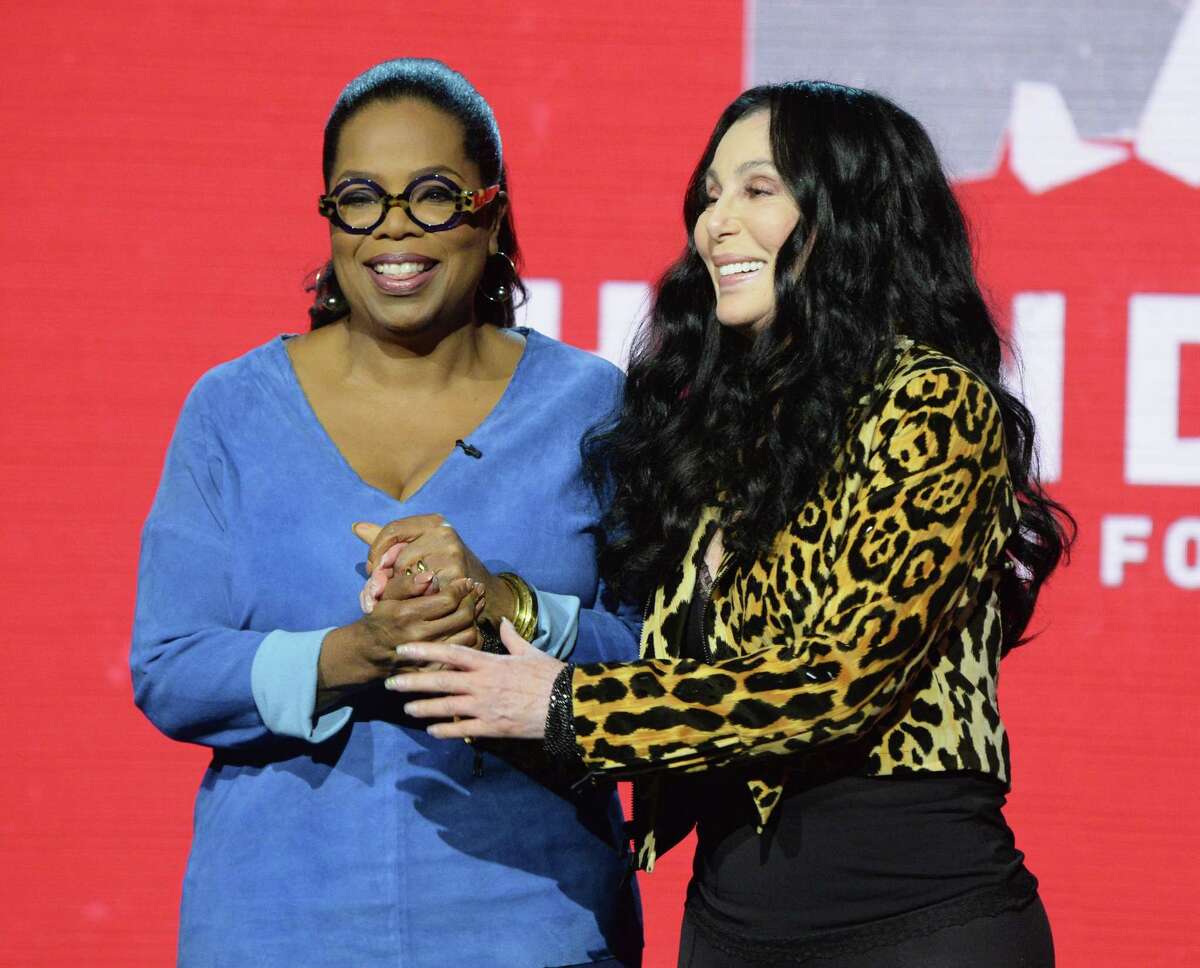 UNIVERSAL CITY, CA - SEPTEMBER 12: In this handout photo provided by Hand in Hand, Oprah Winfrey and Cher attend Hand in Hand: A Benefit for Hurricane Relief at Universal Studios AMC on September 12, 2017 in Universal City, California.
