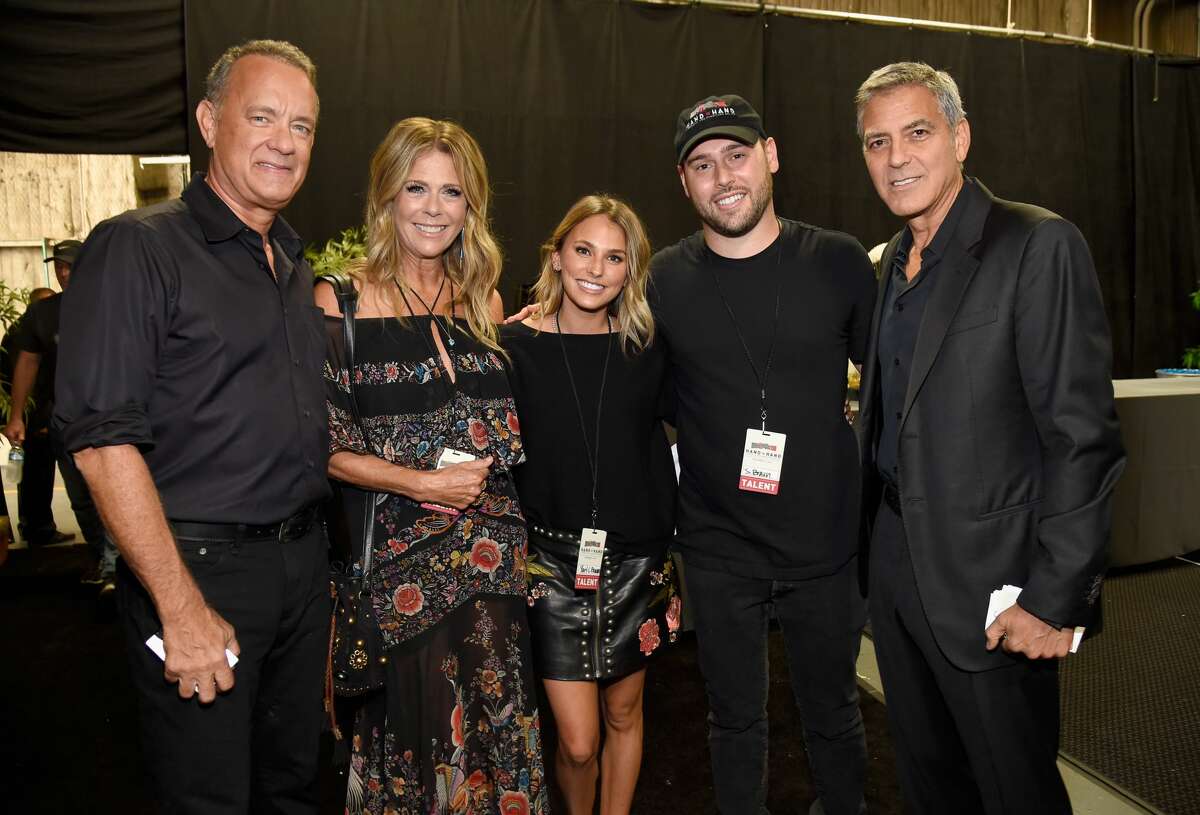 UNIVERSAL CITY, CA - SEPTEMBER 12: In this handout photo provided by Hand in Hand, Tom Hanks, Rita Wilson, Yael Cohen Braun, Scooter Braun and George Clooney attend Hand in Hand: A Benefit for Hurricane Relief at Universal Studios AMC on September 12, 2017 in Universal City, California. (Photo by Kevin Mazur/Hand in Hand/Getty Images)