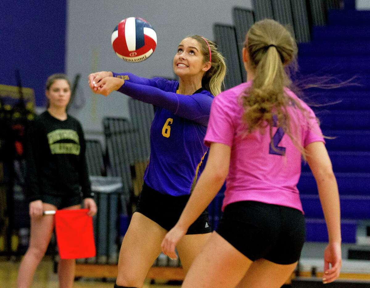 Montgomery outside hitter Molly Scott (6) returns a hit during the first set of a non-district high school volleyball match at Montgomery High School, Tuesday, Sept. 12, 2017.