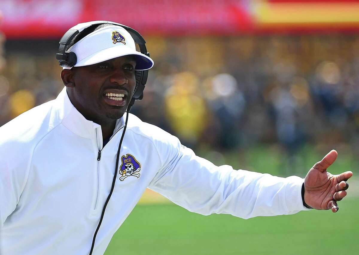 MORGANTOWN, WV - SEPTEMBER 09: Head coach Scottie Montgomery of the East Carolina Pirates looks on during the first quarter against the West Virginia Mountaineers at Mountaineer Field on September 9, 2017 in Morgantown, West Virginia.