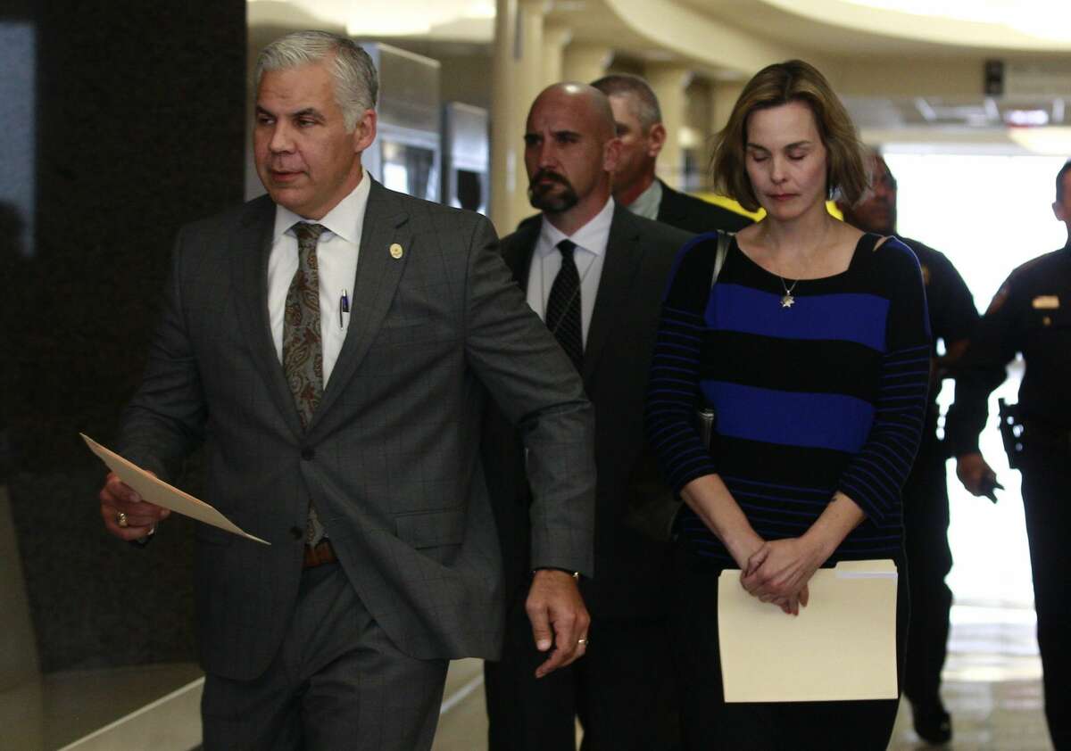 Montgomery County District Attorney Brett Ligon, left arrives at a courtroom with Kathleen Goforth, widow of Harris County Sheriffâs Deputy Darren Goforth, at the Harris County Civil Courthouse, Wednesday, Sept. 13, 2017, in Houston. Shannon Miles, 32, pleaded guilty to capital murder and was sentenced to life without parole for fatally shooting Harris County Sheriffâs Deputy Darren Goforth on Aug. 28, 2015, as he was filling up his patrol car at a gas station in Northeast Harris County.