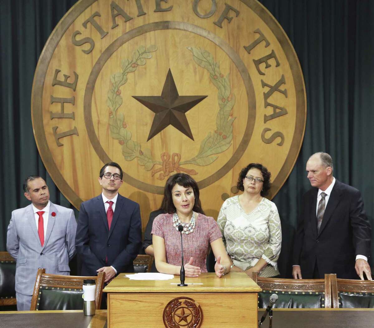 Rep. Gina Hinojosa, D-Austin, makes a point as members of the Mexican American Legislative Caucus speak at the Capitol stating their views of recent governmental action regarding DACA and SB4 in Texas on September 13, 2017.