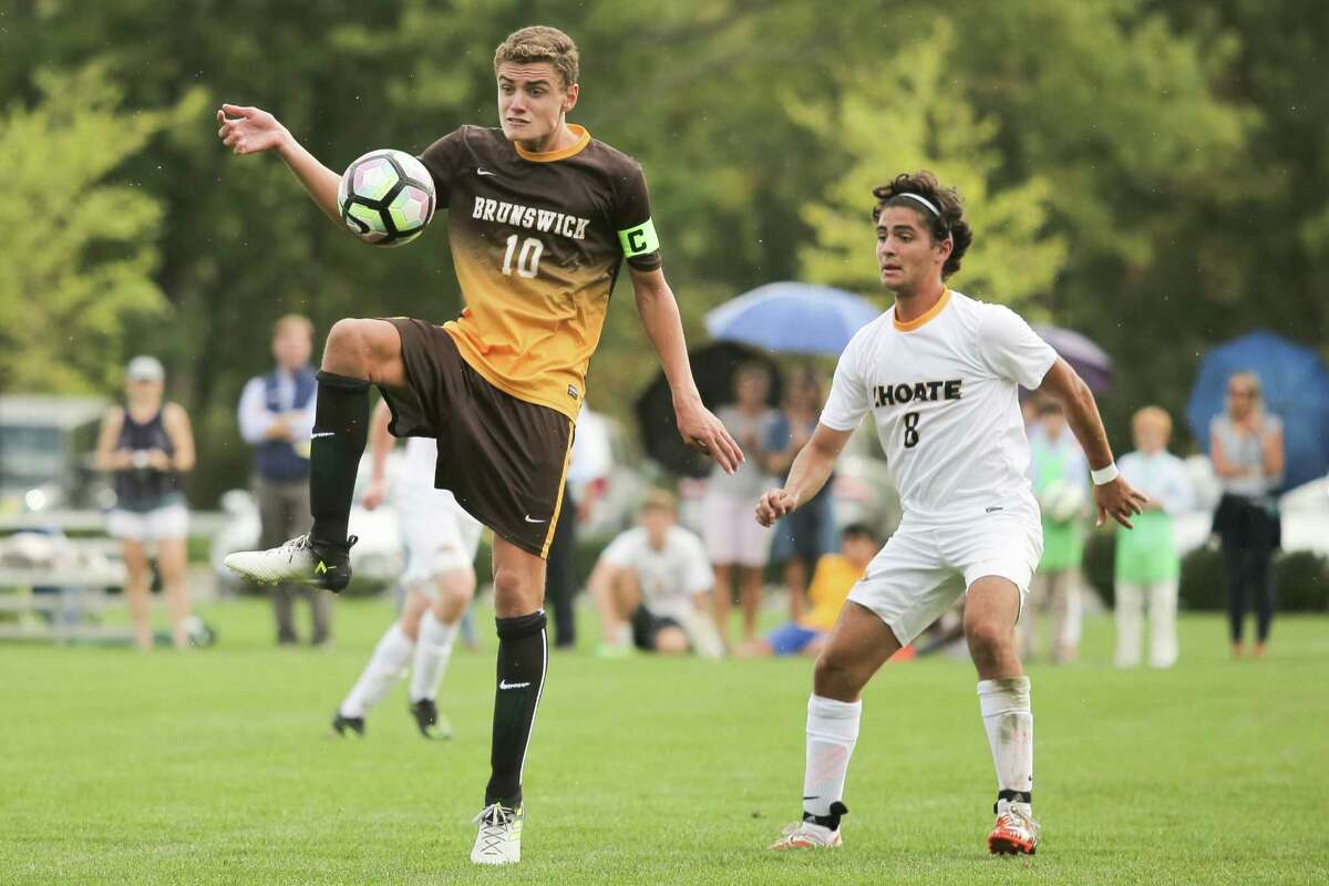 Captain Dante Polvara kicks the ball upfield during the 1-1 tie between the Bruins and Choate at Brunswick School in Greenwich on Wednesday, September 13, 2017.