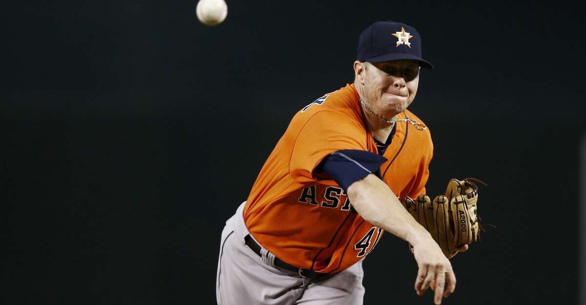 Houston Astros' Brad Peacock warms up during the first inning of a baseball game against the Arizona Diamondbacks Tuesday, Aug. 15, 2017, in Phoenix. The Astros defeated the Diamondbacks 9-4. (AP Photo/Ross D. Franklin)