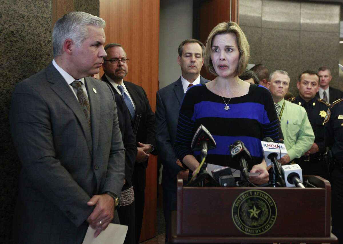 Kathleen Goforth, widow of Harris County SheriffÂ?’s Deputy Darren Goforth, speaks beside Montgomery County District Attorney Brett Ligon, left, during a press conference at the Harris County Civil Courthouse, Wednesday, Sept. 13, 2017, in Houston. Shannon Miles, 32, pleaded guilty to capital murder and was sentenced to life without parole for fatally shooting her husband on Aug. 28, 2015, as he was filling up his patrol car at a gas station in Northeast Harris County.