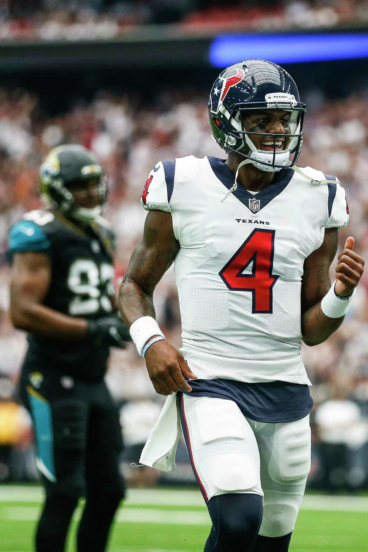Houston Texans quarterback Deshaun Watson (4) reacts after throwing a touchdown pass in the second half as the Houston Texans lose to the Jacksonville Jaguars 29-7 at NRG Stadium Sunday, Sept. 10, 2017 in Houston. ( Michael Ciaglo / Houston Chronicle)