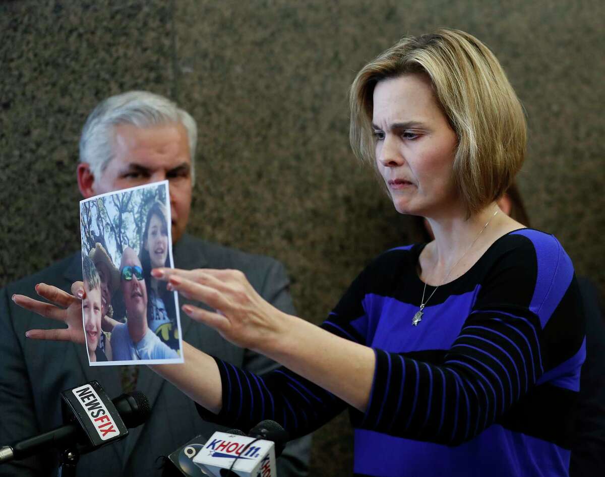 Holding up a picture of Darren Goforth with his kids, Kathleen Goforth said Wednesday she wants her husband remembered "as a man who loved his family."﻿