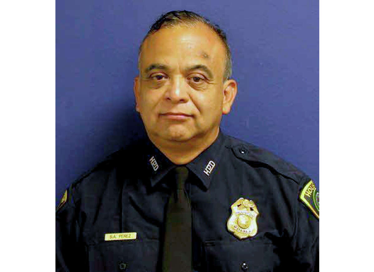 This undated photo provided by the Houston Police Department shows Sgt. Steve Perez. On Tuesday, Aug. 29, 2017, Houston Police Chief Art Acevedo said Perez had lost his life trying to get to work when he became trapped in his patrol car in a flooded highway underpass. Perez had been with the force for 34 years.