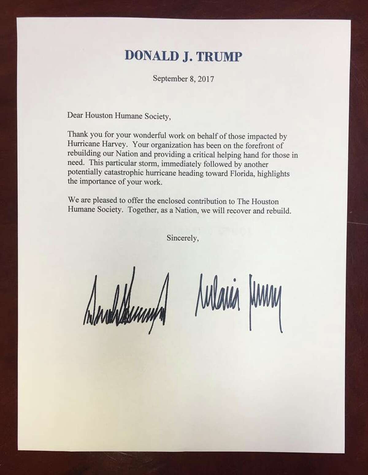 Houston's Humane Society received a check  and letter Wednesday from President Donald Trump and his wife Melania Trump to help them with recovery efforts. 