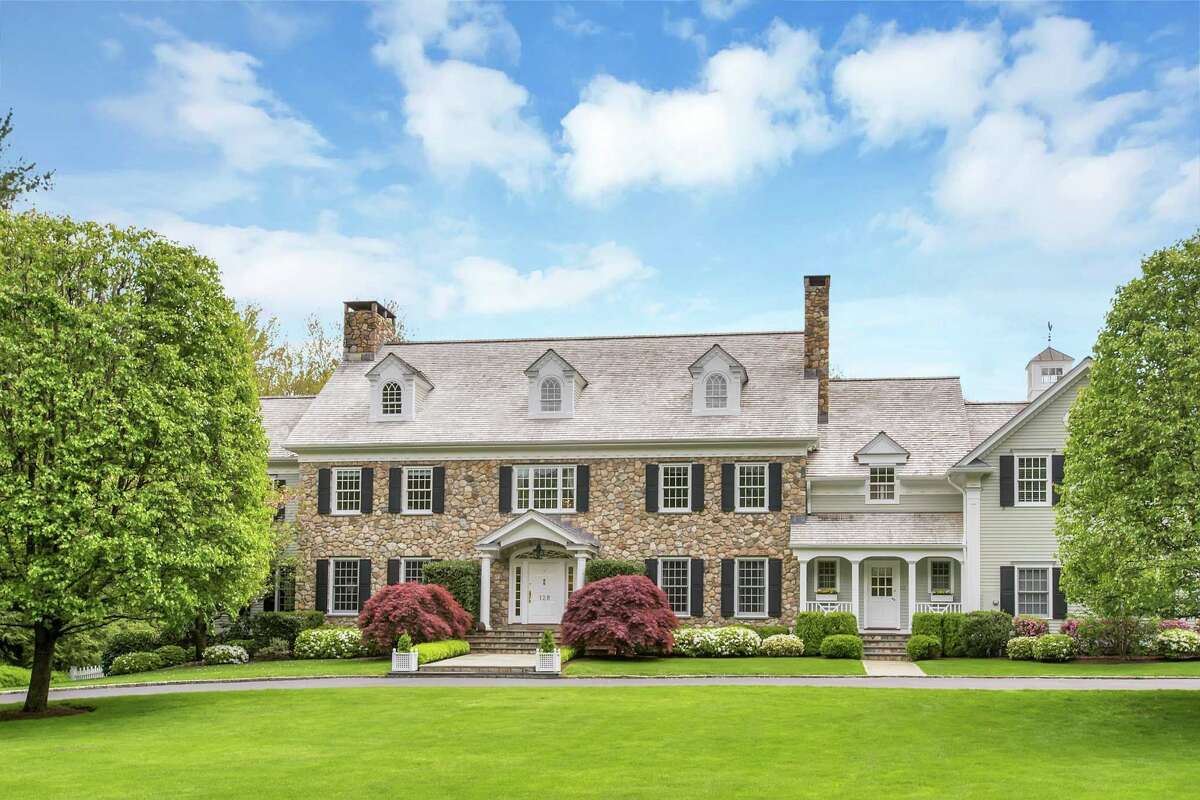 On the Market / Stone and clapboard home on over two landscaped acres