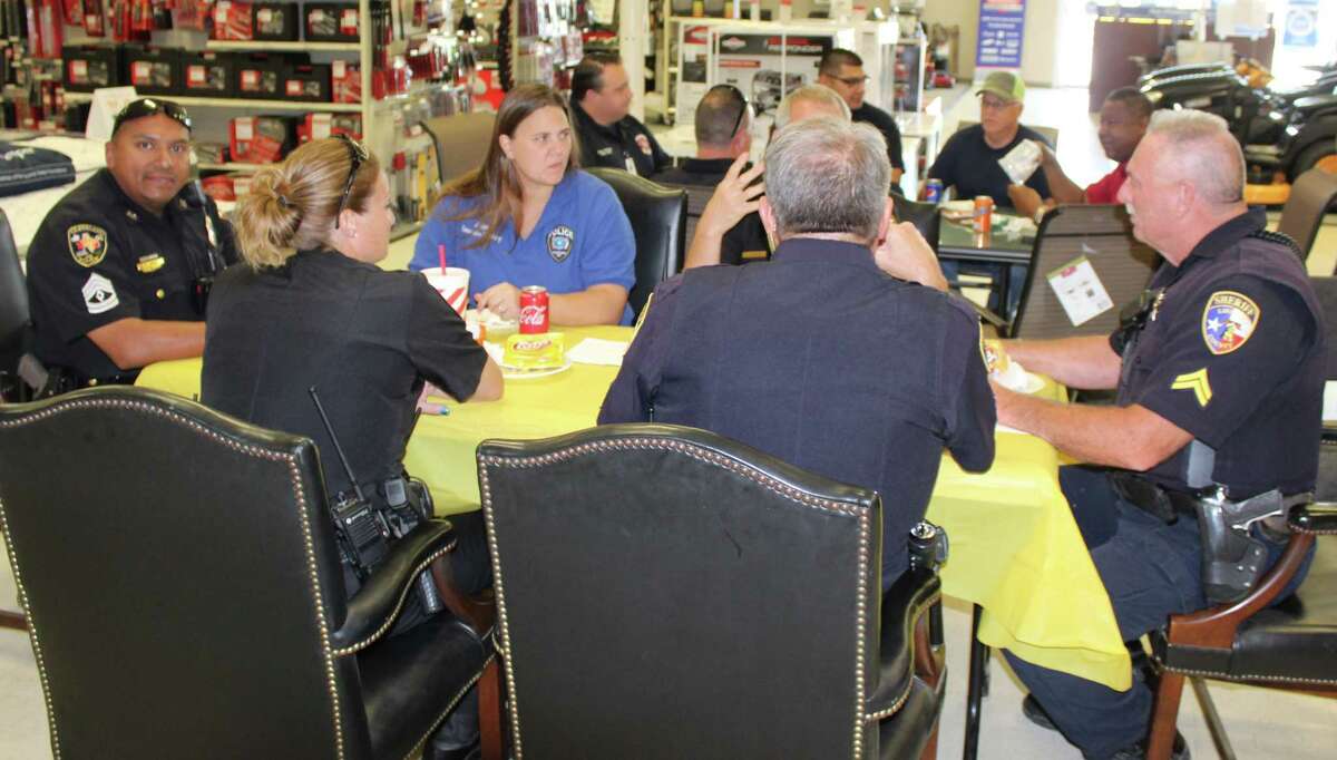 Law enforcement, firefighters, EMS workers and other first responders in the Cleveland area gather at Sears Hometown Store on Sept. 12, where employees show them their appreciation by serving them lunch.