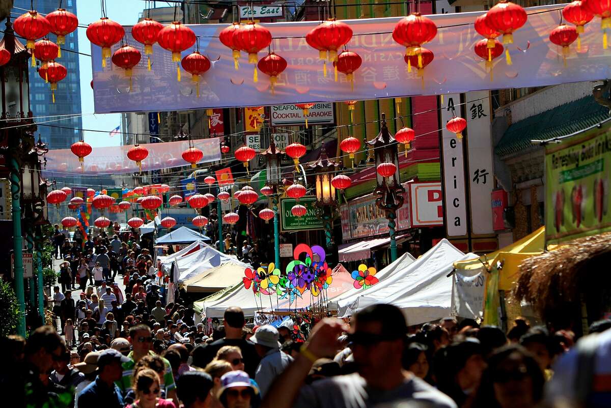 Crowds pack Grant Ave. for the 22nd annual Autumn Moon Festival in Chinatown in San Francisco, Calif., Saturday, September 22, 2012.