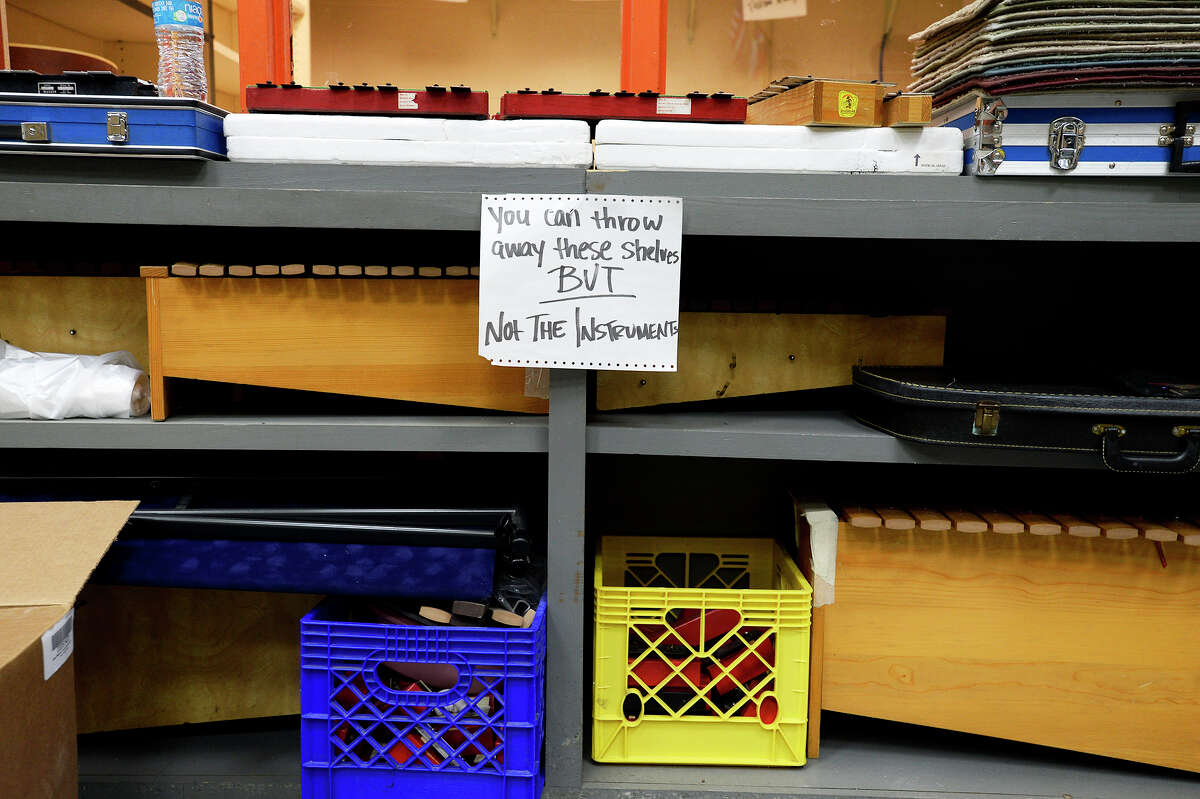 A sign warns workers not to throw away xylophones in the chorus room at Vidor Middle School on Thursday. The school's fifth graders will go to class in a separate wing at Vidor High School, and the sixth graders will go to the junior high. Photo taken Thursday 9/14/17 Ryan Pelham/The Enterprise