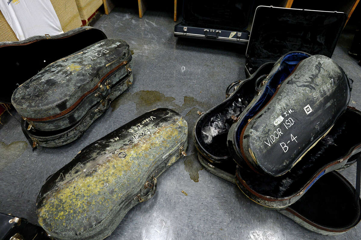 Moldy instrument cases in the band room at Vidor Middle School on Thursday. The school's fifth graders will go to class in a separate wing at Vidor High School, and the sixth graders will go to the junior high. Photo taken Thursday 9/14/17 Ryan Pelham/The Enterprise