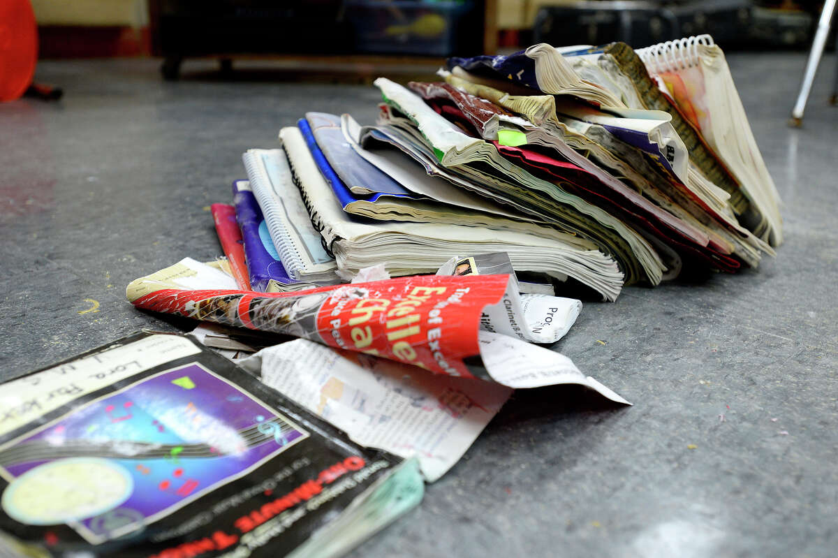 Damaged books dry in the band room at Vidor Middle School on Thursday. The school's fifth graders will go to class in a separate wing at Vidor High School, and the sixth graders will go to the junior high. Photo taken Thursday 9/14/17 Ryan Pelham/The Enterprise