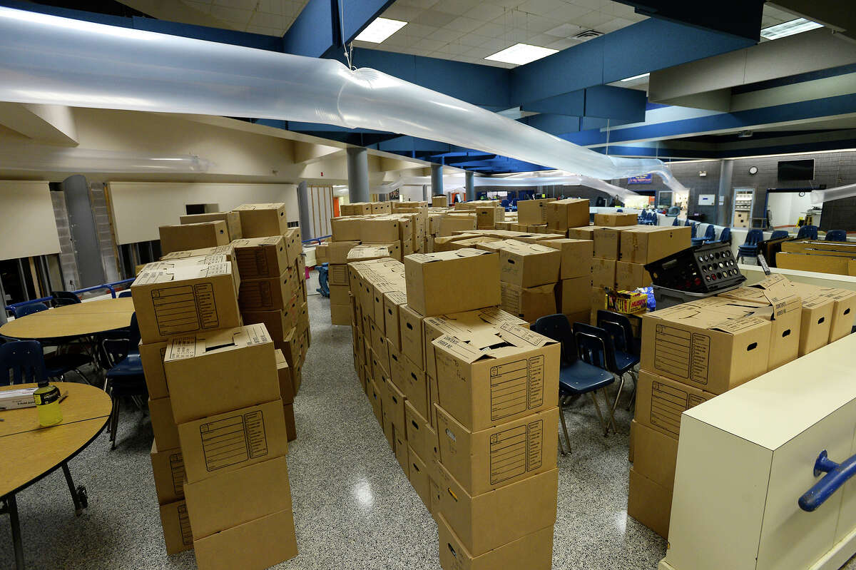 Boxes of damaged books at Vidor Middle School on Thursday. The school's fifth graders will go to class in a separate wing at Vidor High School, and the sixth graders will go to the junior high. Photo taken Thursday 9/14/17 Ryan Pelham/The Enterprise