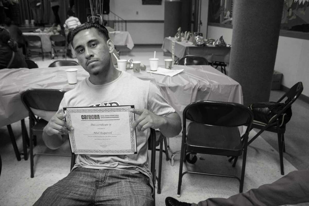 Abel Esquivel poses with a certificate from the Central American Resource Center in San Francisco’s Mission District, where he worked as a summer intern. Esquivel was killed on Aug. 15 with a gun that was stolen from a city police officer’s vehicle.