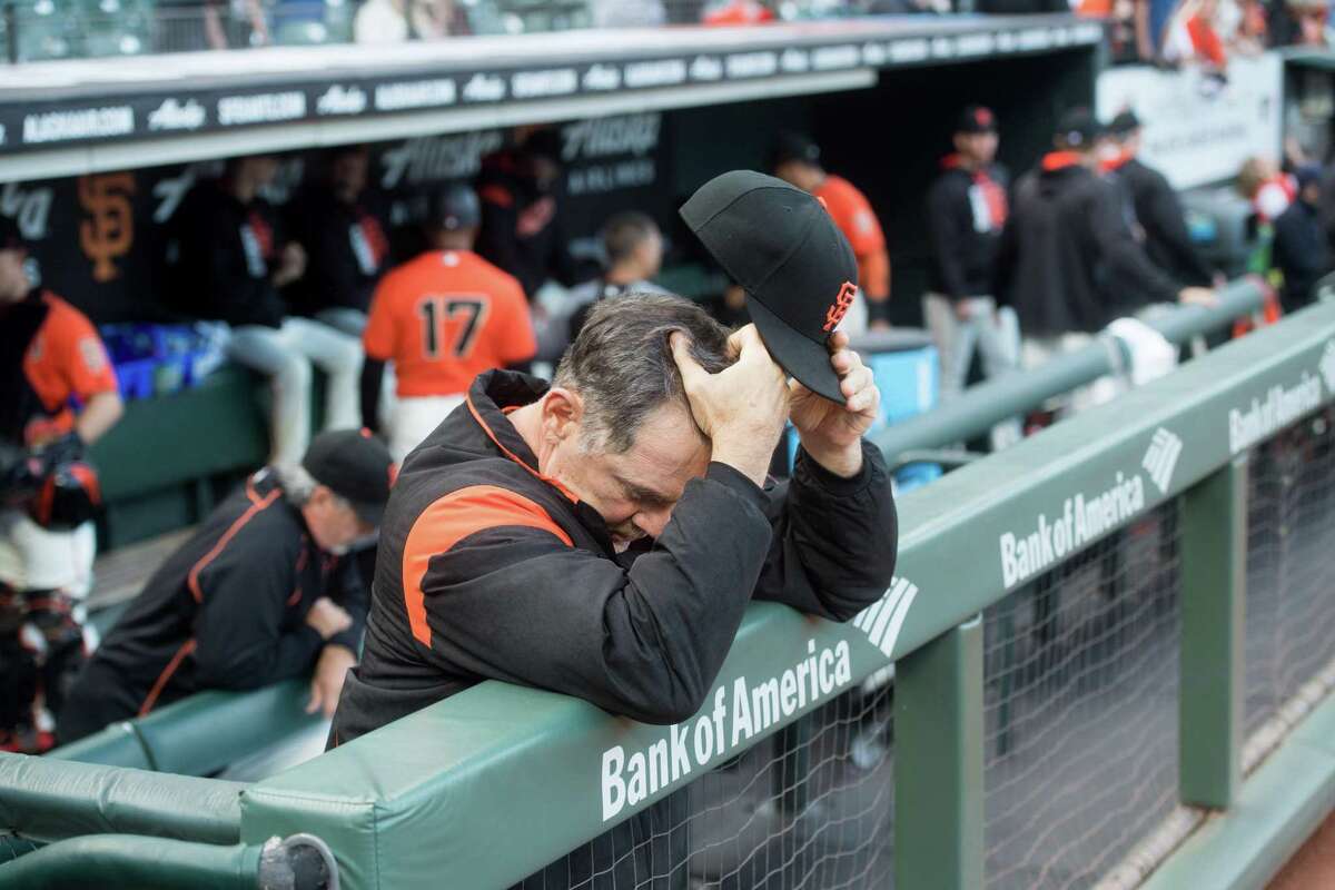Giants manager Bruce Bochy rubs his head before the start of a game against the Mets on Friday, June 23, 2017, in San Francisco.