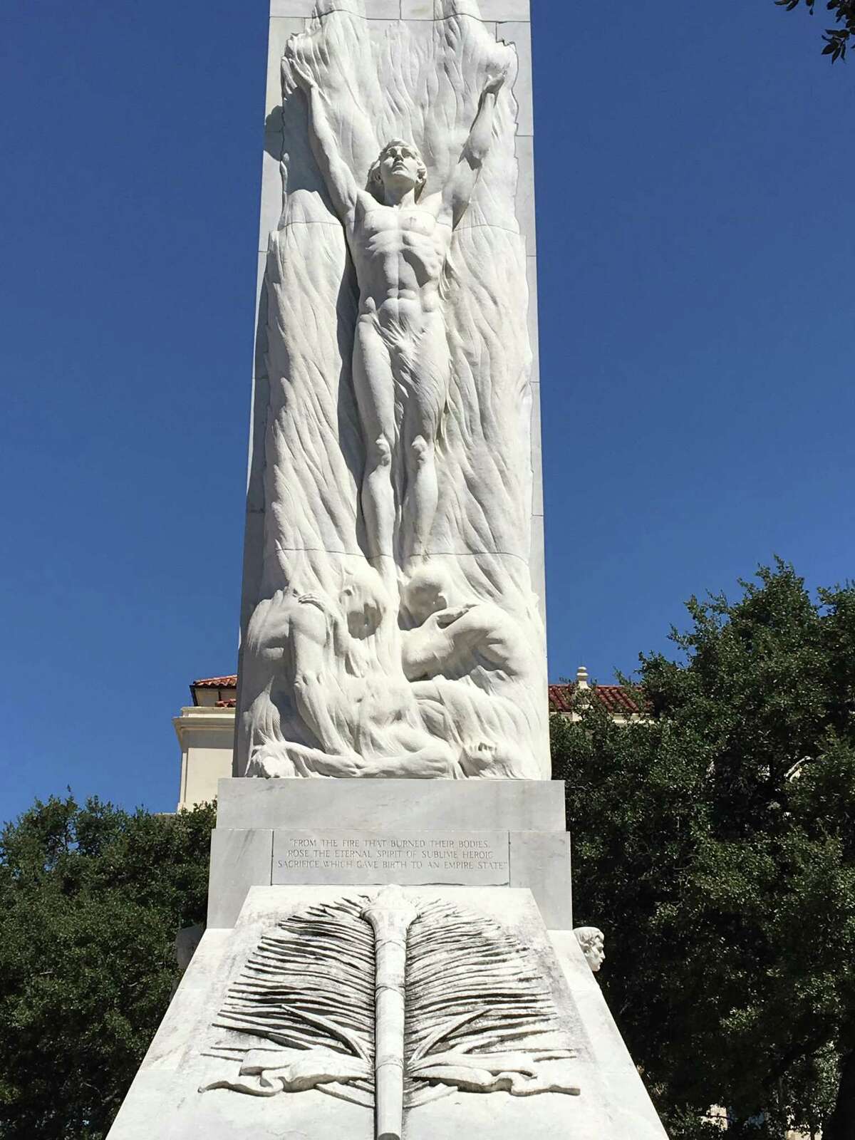 The 1930s Alamo Cenotaph, a work by artist Pompeo Coppini titled "The Spirit of Sacrifice," includes sculpted images of flames and text referencing “fire that burned their bodies.” But a 1999 report by UTSA archaeologists said the Cenotaph's location is likely "the only place that can safely be eliminated from contention" as a site of a funeral pyre after the 1836 battle.