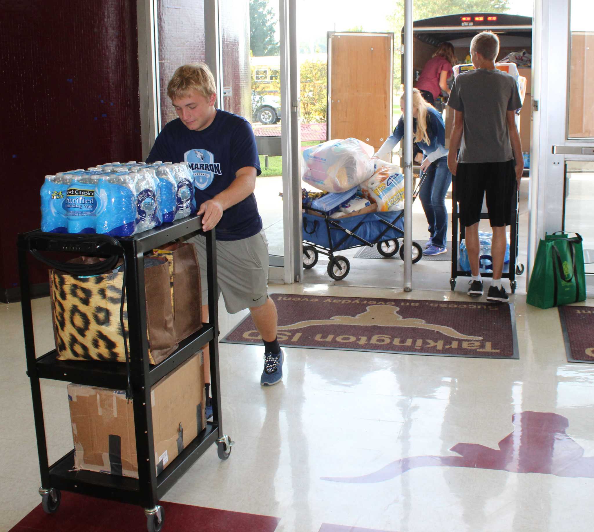 Kansas school students and staff donate supplies to Tarkington ISD