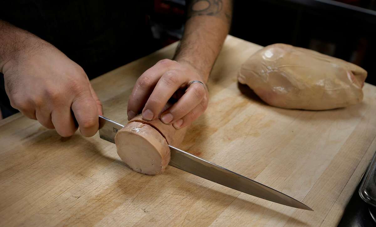 Executive chef, David Bazirgan prepares Foie Gras Torchon, at Dirty Habit restaurant in San Francisco, Calif. on Wednesday Jan. 7, 2015.