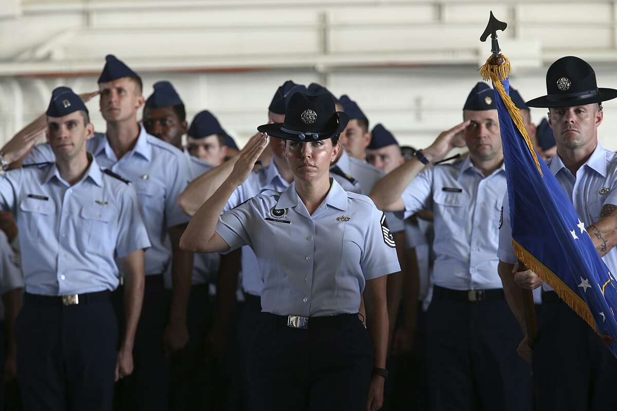 Flights of Airmen salute the flag during a change of command ceremony at the Air Education and Training Command, Joint Base San Antonio-Randolph in 2015. The education of airmen has adapted to meet emerging needs.