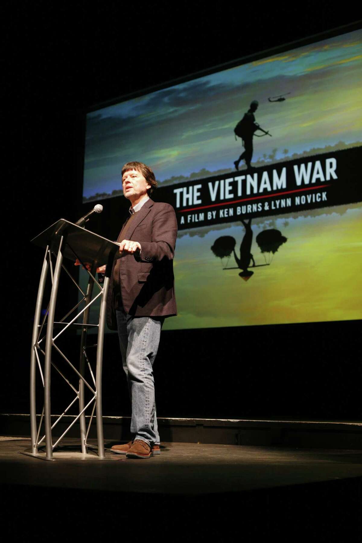Clockwise from top: Ken Burns and Lynn Novick spent six years pouring over footage and historical accounts to make "The Vietnam War"; Mary Ann Vecchio kneels over the body of fellow student anti-war protester Jeffrey Miller, who was killed by Ohio National Guard troops during an antiwar demonstration at Kent State University in 1970; Burns discusses the project in April at the University of Houston; and South Vietnamese troops fly over the Mekong Delta in 1963.