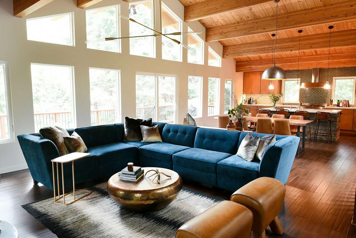 The upstairs living room and kitchen of Will and Caryn Sloan’s vacation home in Homewood (Placer County) near Lake Tahoe.