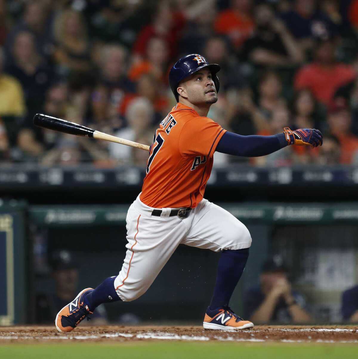 Houston Astros designated hitter Jose Altuve (27) flies out during the second inning of an MLB baseball game at Minute Maid Park, Friday, Sept. 15, 2017, in Houston. ( Karen Warren / Houston Chronicle )