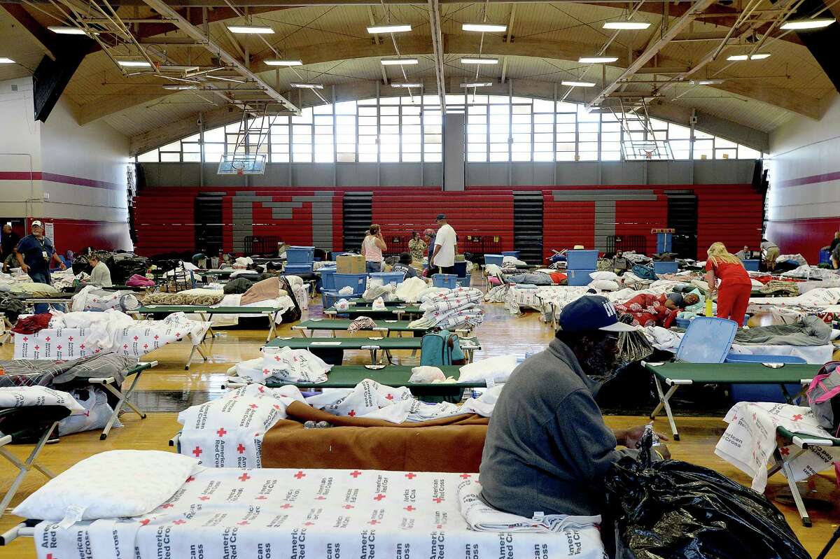 Tropical Storm Harvey evacuees at a Red Cross shelter in 2017. The coronavirus pandemic adds new complexities to planning for hurricane season 2020, which begins Monday, June 1. Kim Brent/Enterprise File Photo